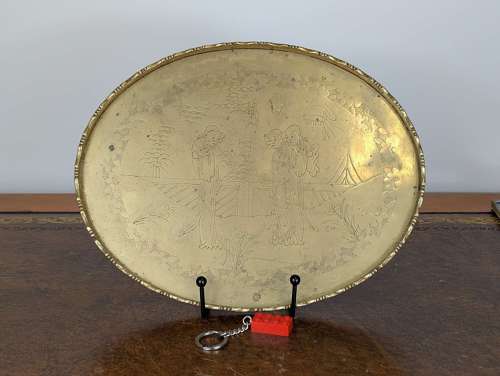 Chinese late 19th-century brass opium tray with engraved court scene