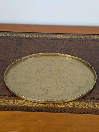 Chinese late 19th-century brass opium tray with engraved court scene