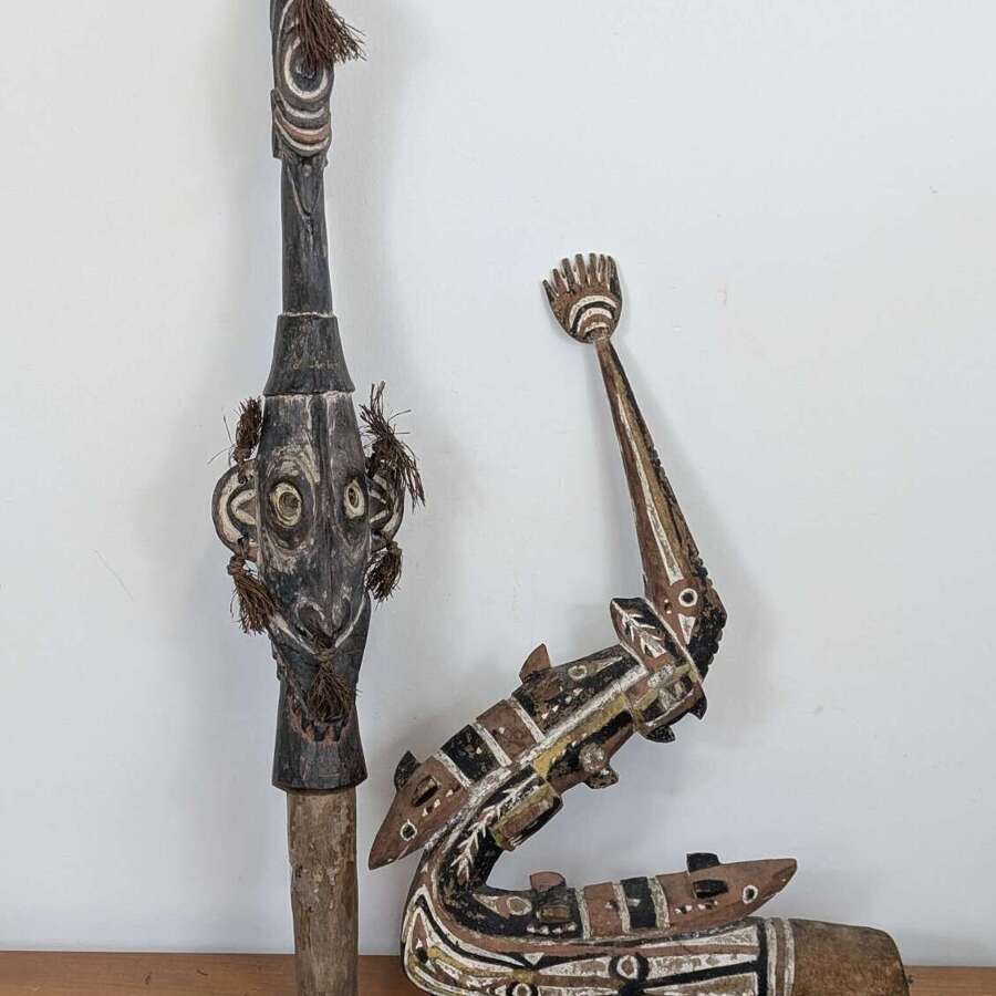 Pair of Papua New Guinea canoe prow carvings in pigment-painted hardwood, mid-20th century