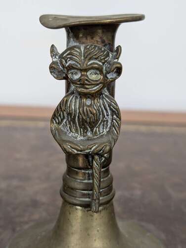 Rare pair Victorian brass Lincoln imp candlesticks in gothic revival style, 19th century