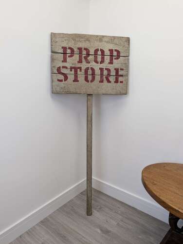 Vintage wooden TV studio 'Prop Store' sign, British production, used set piece