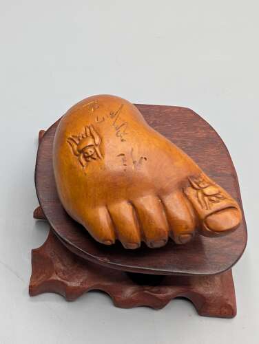 Japanese boxwood carved netsuke group of three, kirin, teapot & foot with hardwood stand
