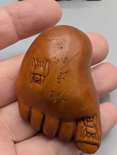 Japanese boxwood carved netsuke group of three, kirin, teapot & foot with hardwood stand