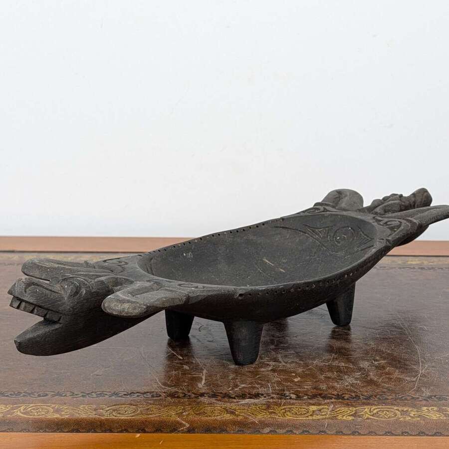 Dayak Borneo ironwood offering bowl with Aso figures, Rajang River Sarawak, 20th century