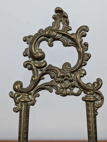 Gilt brass Rococo style adjustable picture easel stand, 31 cm tall