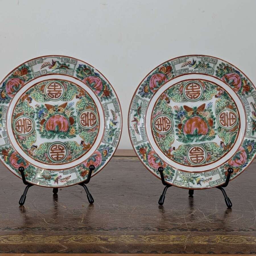 Chinese Famille Rose 'Longevity' saucers with Shou symbols and peaches