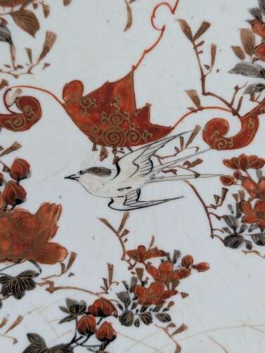 Japanese Kutani porcelain plate with aka-e bird and flowers, early Meiji
