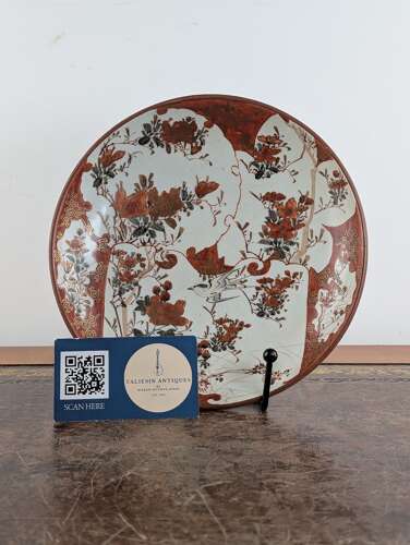 Japanese Kutani porcelain plate with aka-e bird and flowers, early Meiji