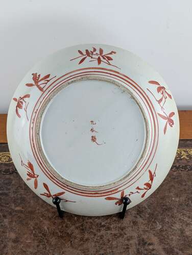 Japanese Kutani porcelain plate with aka-e bird and flowers, early Meiji