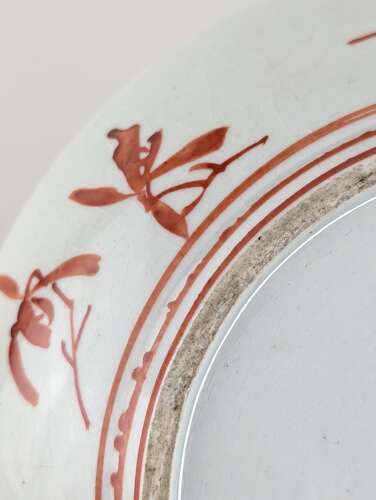 Japanese Kutani porcelain plate with aka-e bird and flowers, early Meiji