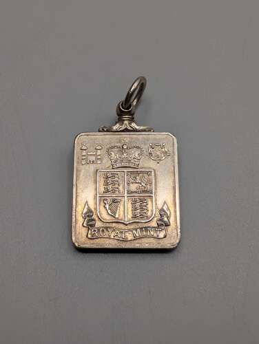 Royal Mint sterling silver proof-set plaque pendant, 1984