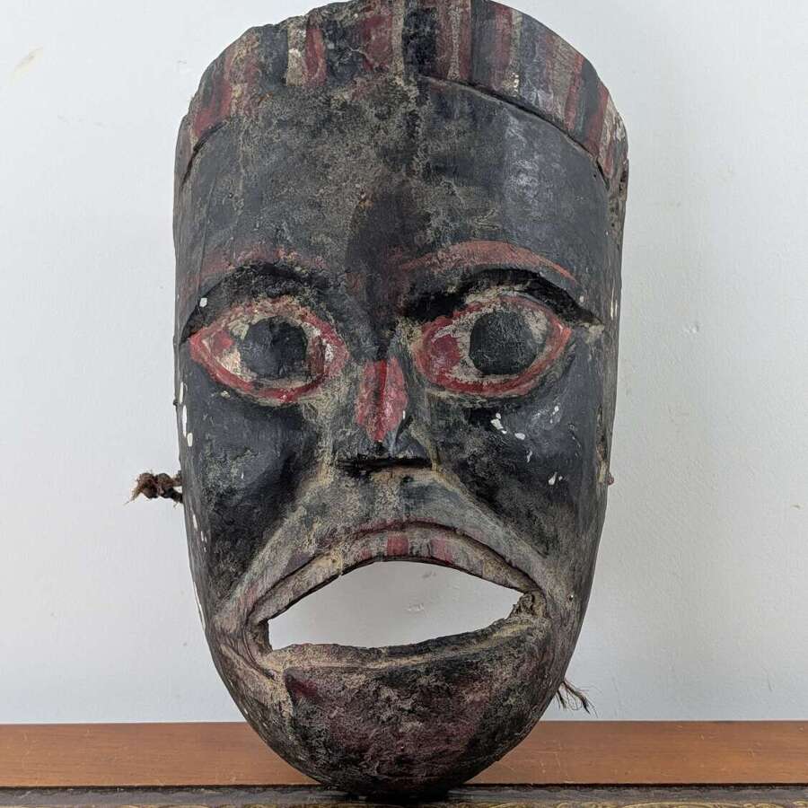Nepalese shaman mask in carved wood with surviving pigment, 18th to 19th century
