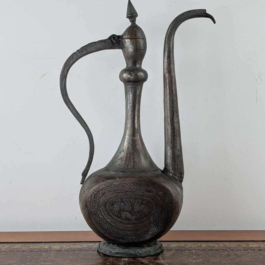 Persian Qajar tinned copper aftaba water ewer with animal engraving, 19th century