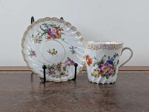 Antique Dresden porcelain hand-painted floral cup and saucer circa 1900