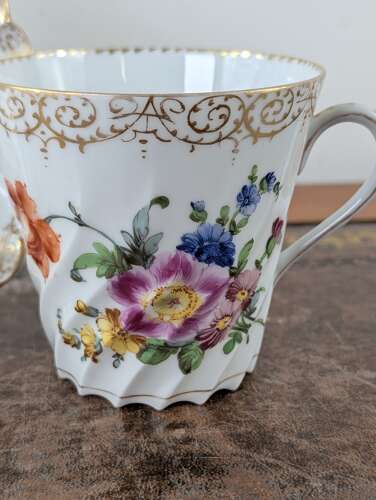 Antique Dresden porcelain hand-painted floral cup and saucer circa 1900