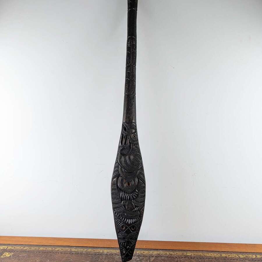 Antique Māori carved wooden ceremonial paddle with tiki figures New Zealand circa 1920