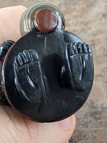 Japanese lacquered wood netsuke of a laughing boy with kettle
