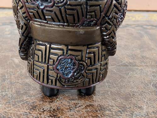 Japanese lacquered wood netsuke of a laughing boy with kettle